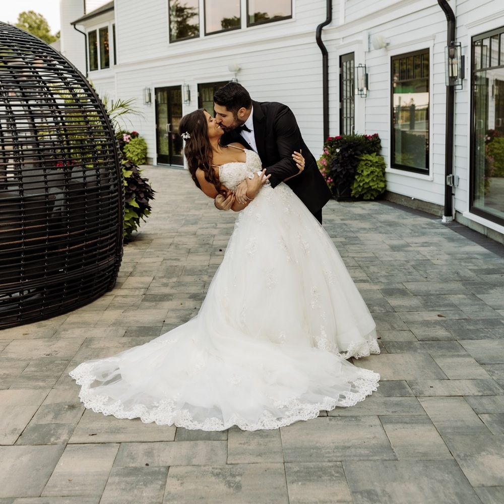 Wedding dress. Designer Morilee. Dress size:8, street size:6. Bustle added.